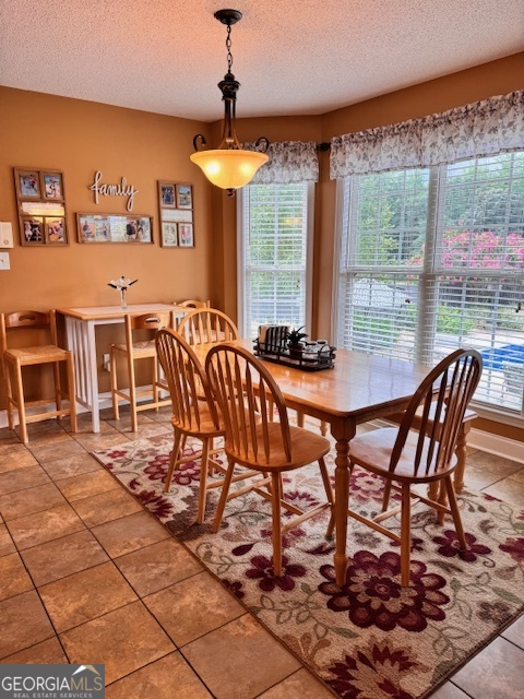 495 Hanley Road Hull, GA 30646 - Photo 12 of 36 a dining room with furniture and window