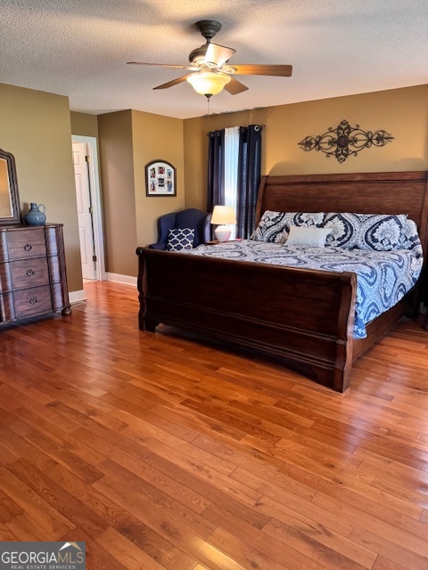 495 Hanley Road Hull, GA 30646 - Photo 19 of 36 a living room with furniture and wooden floor