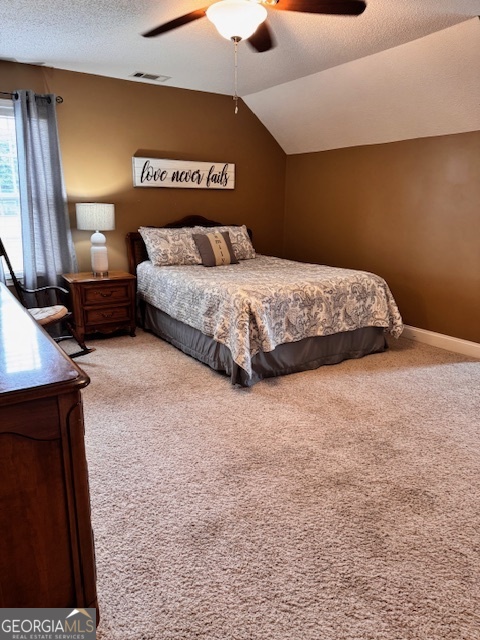 495 Hanley Road Hull, GA 30646 - Photo 25 of 36 a bedroom with a bed and a night stand