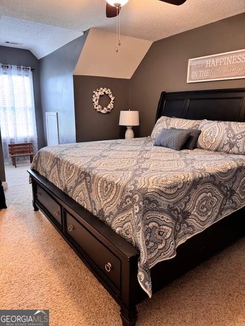 495 Hanley Road Hull, GA 30646 - Photo 30 of 36 a large bed sitting in a bedroom next to a window