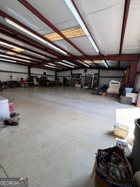 495 Hanley Road Hull, GA 30646 - Photo 33 of 36 a room with furniture and a flat screen tv