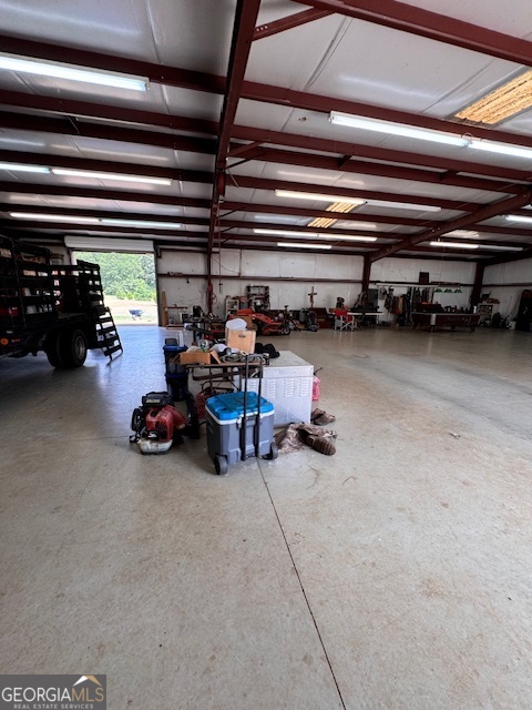 495 Hanley Road Hull, GA 30646 - Photo 35 of 36 a view of a garage with parked cars