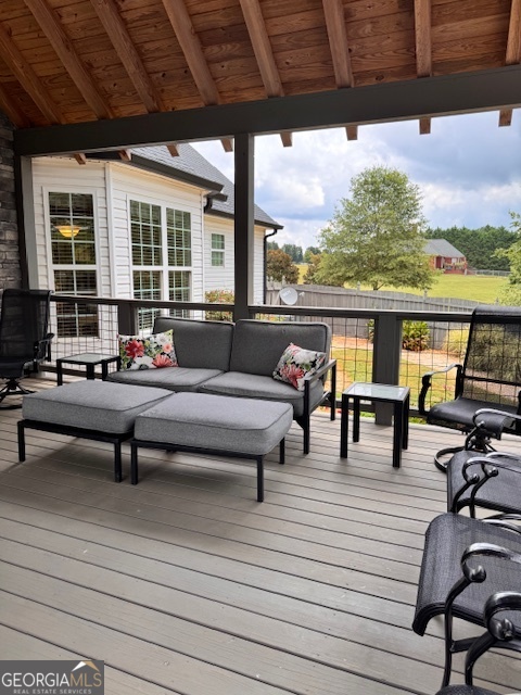 495 Hanley Road Hull, GA 30646 - Photo 5 of 36 a reading room with furniture and a floor to ceiling window