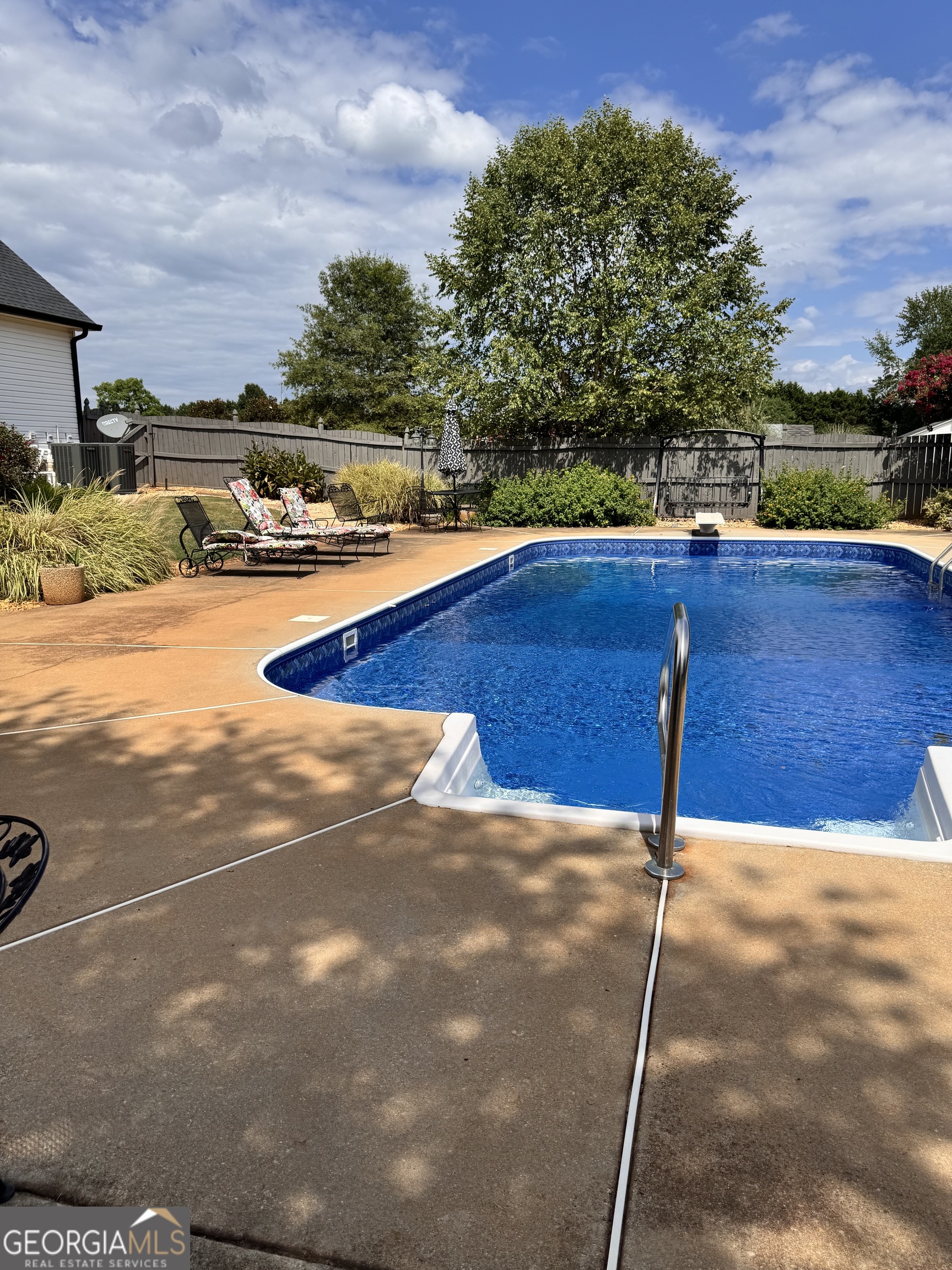 495 Hanley Road Hull, GA 30646 - Photo 9 of 36 a view of a yard with a slide