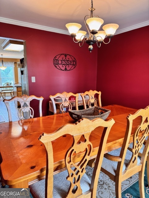 495 Hanley Road Hull, GA 30646 - Photo 10 of 36 a view of a dining room with furniture and chandelier