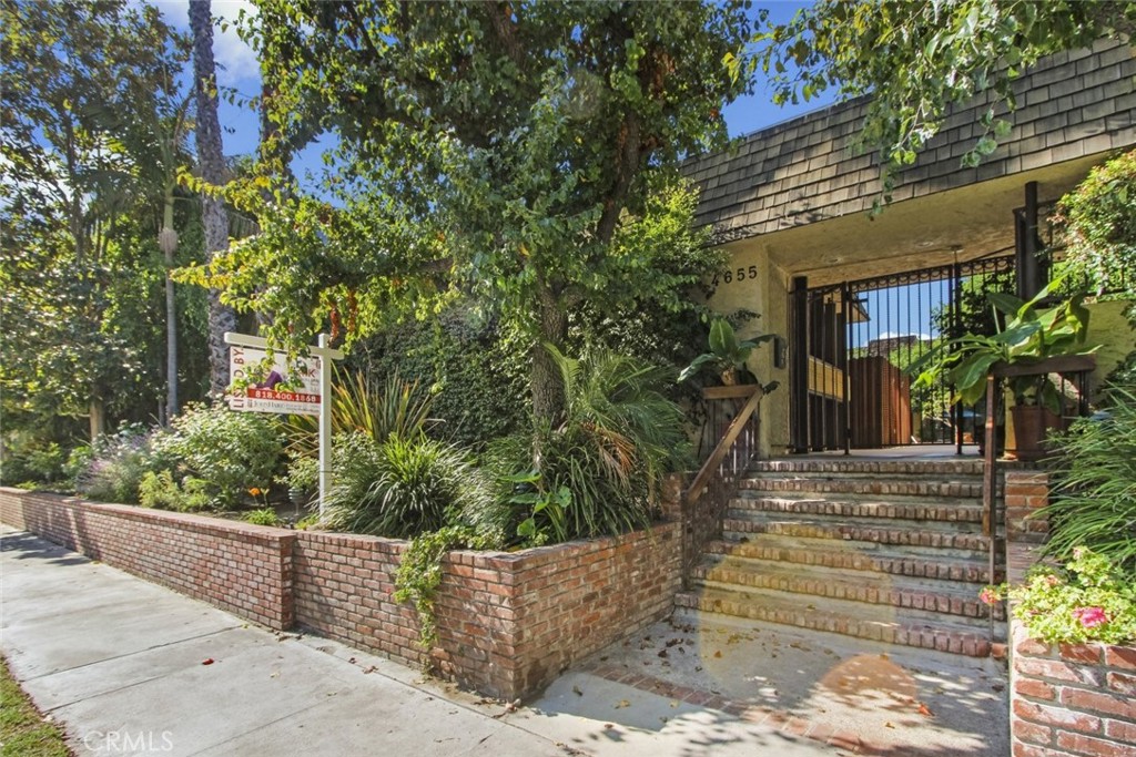 4655 Natick Avenue, Unit 3 Sherman Oaks, CA 91403 - Photo 1 of 25 a view of a house with a tree
