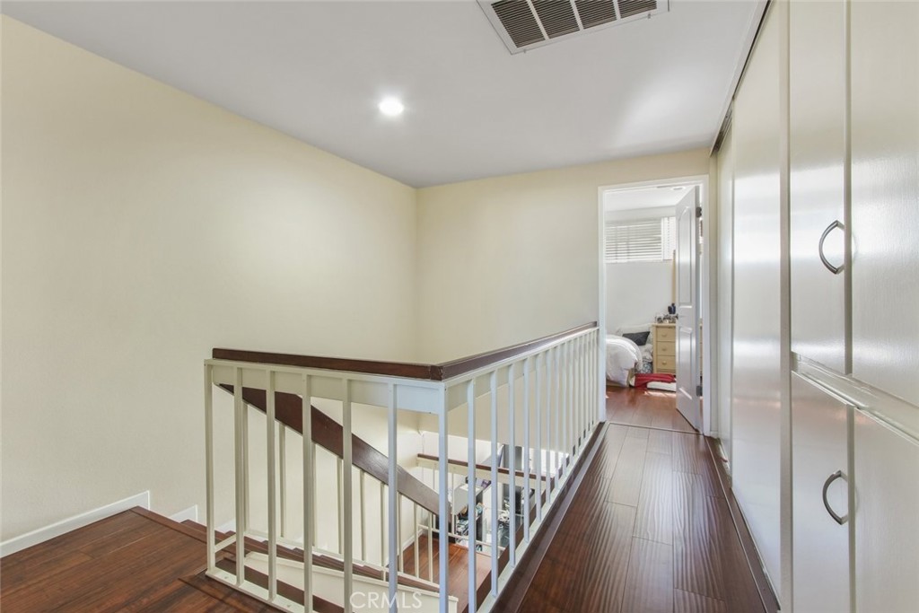 4655 Natick Avenue, Unit 3 Sherman Oaks, CA 91403 - Photo 18 of 25 a view of a hallway with wooden floor