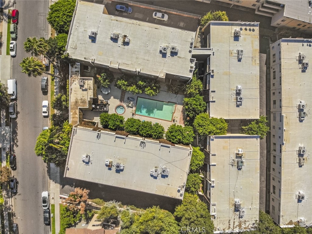 4655 Natick Avenue, Unit 3 Sherman Oaks, CA 91403 - Photo 25 of 25 an aerial view of a residential apartment building with a yard
