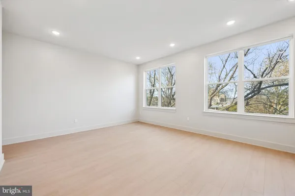 an empty room with windows