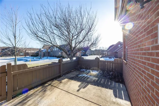 a view of a patio with a yard