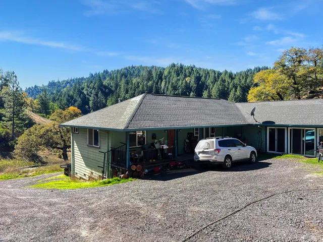 a car parked in front of a house