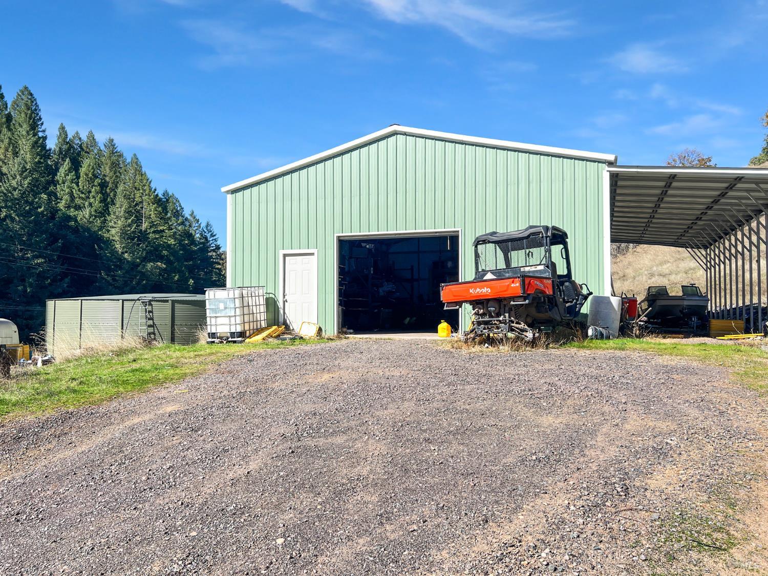 8800 Cave Creek Road Redwood Valley, CA 95470 - Photo 12 of 12 a house with car parked in front of it