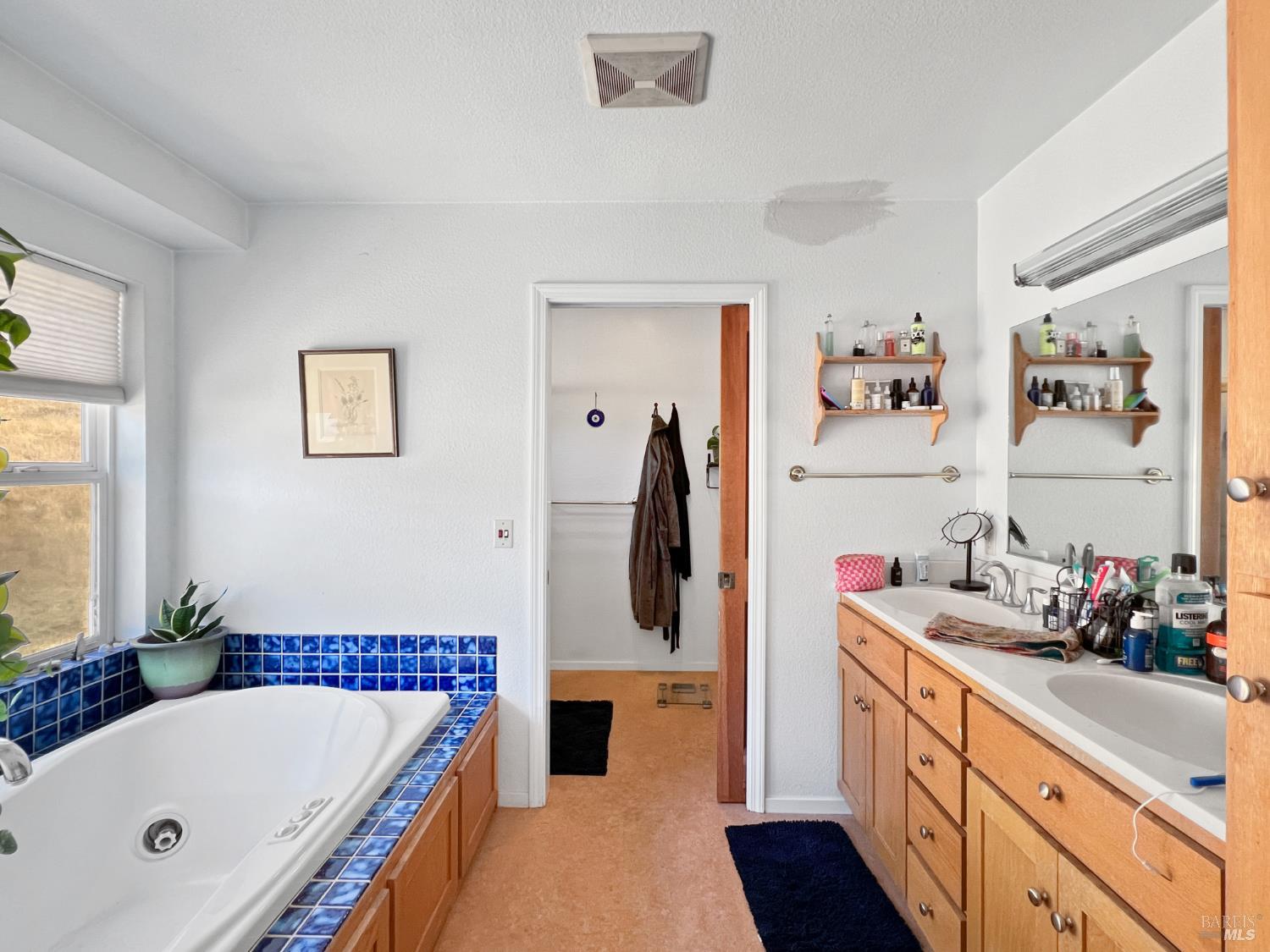 8800 Cave Creek Road Redwood Valley, CA 95470 - Photo 9 of 12 a bathroom with a tub and a shower