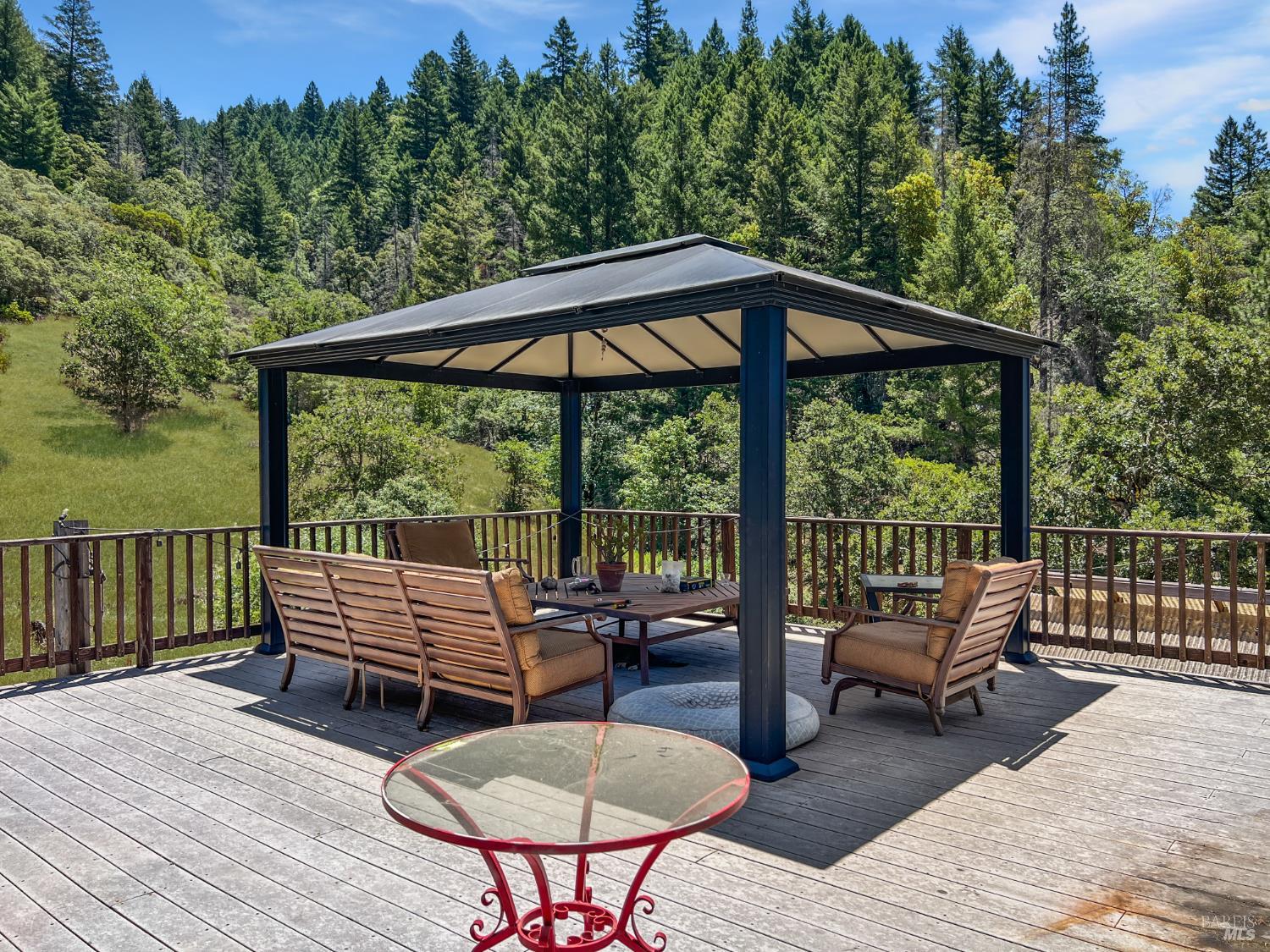 8800 Cave Creek Road Redwood Valley, CA 95470 - Photo 10 of 12 a view of chairs and deck in the patio
