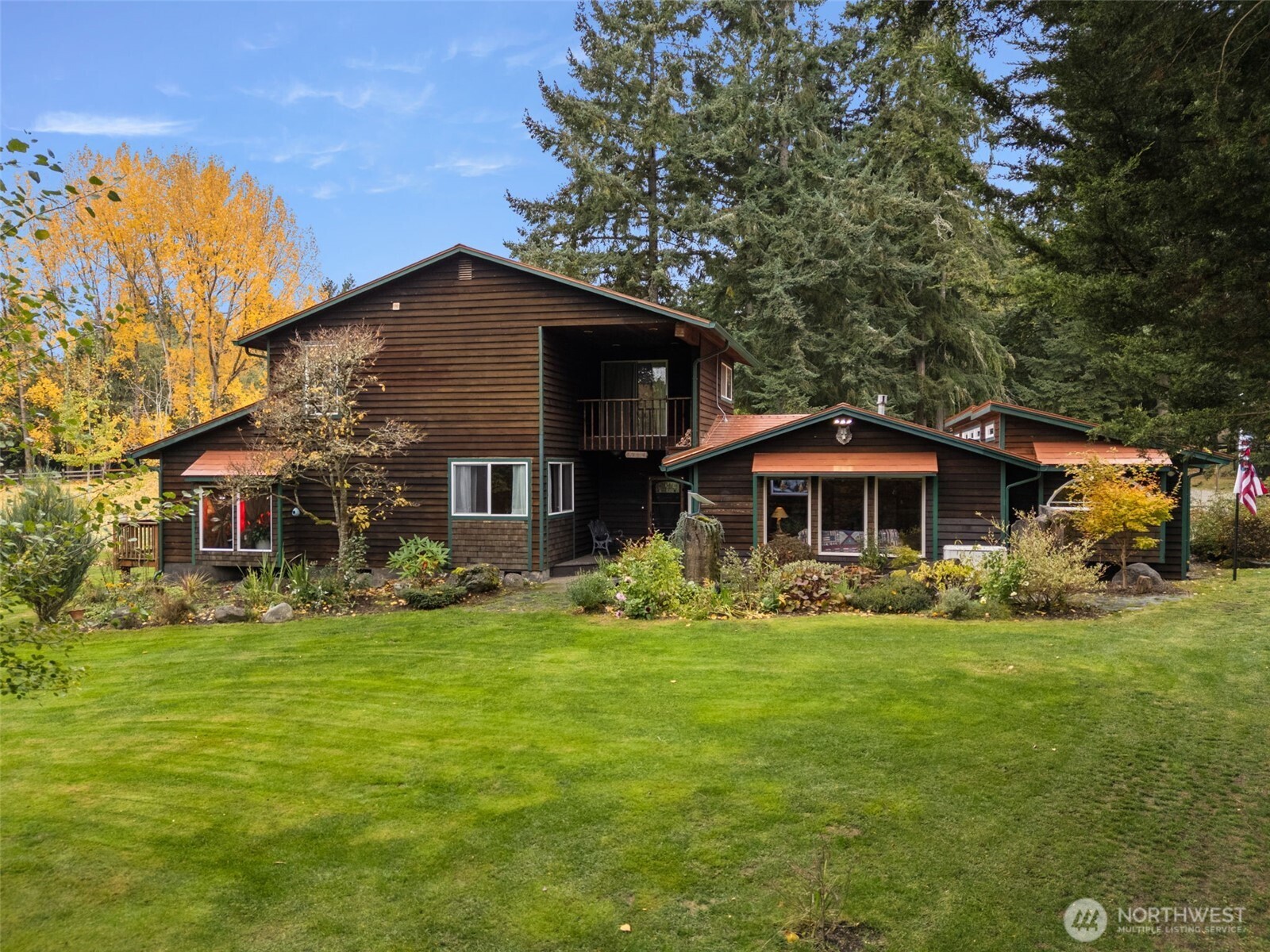 4914 182nd Avenue Southwest Longbranch, WA 98351 - Photo 1 of 37 a view of a house with a yard