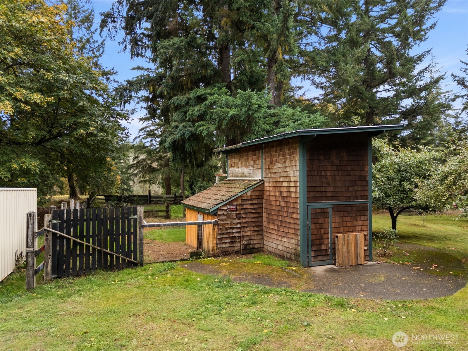 4914 182nd Avenue Southwest Longbranch, WA 98351 - Photo 29 of 37 a front view of a house with a yard