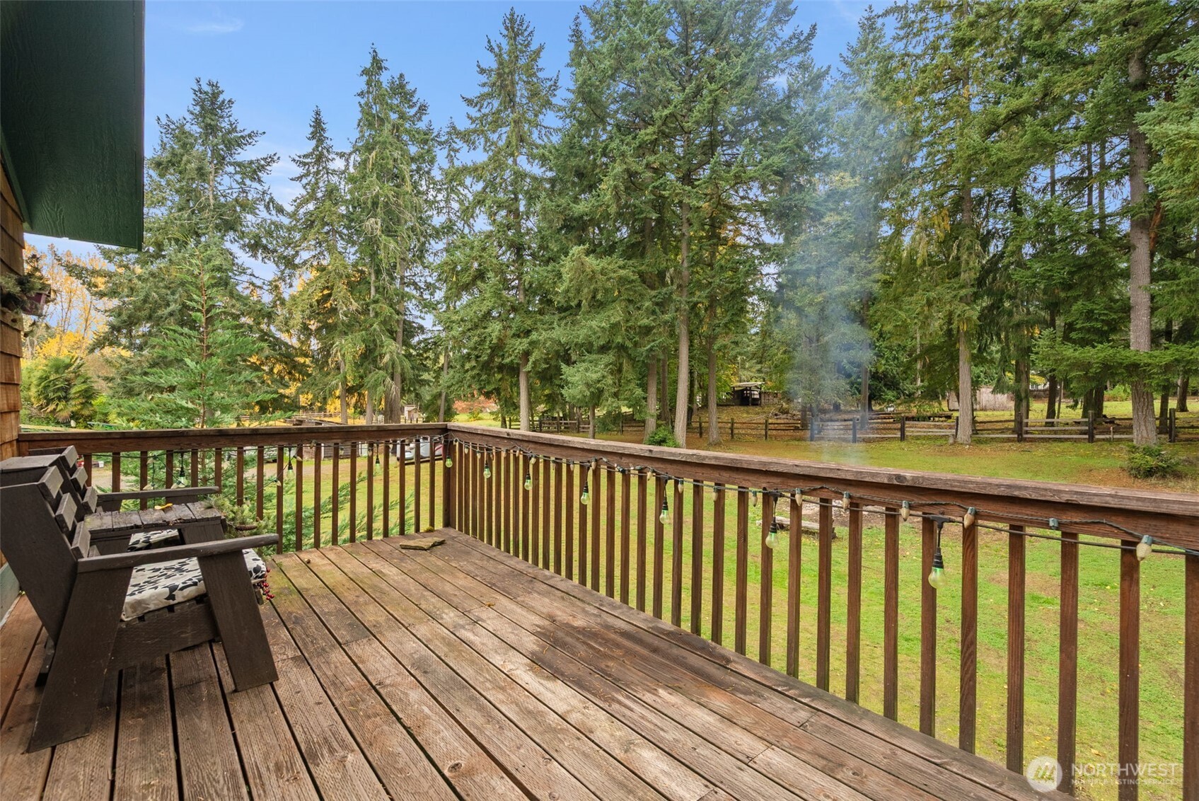 4914 182nd Avenue Southwest Longbranch, WA 98351 - Photo 31 of 37 a view of balcony with wooden floor and fence