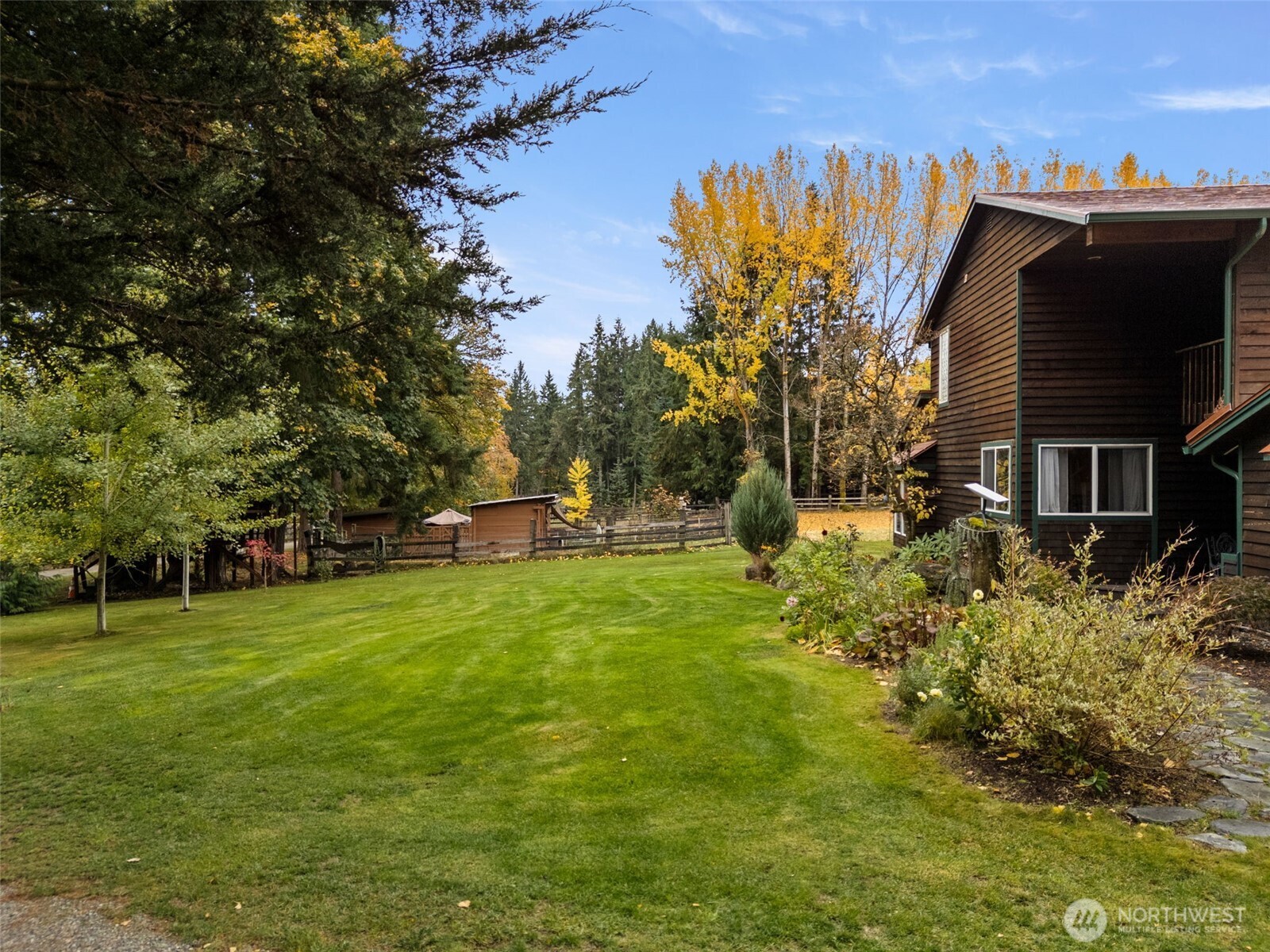 4914 182nd Avenue Southwest Longbranch, WA 98351 - Photo 4 of 37 a view of a garden