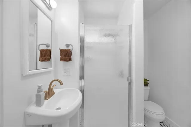 a view of a chairs and table in a patio