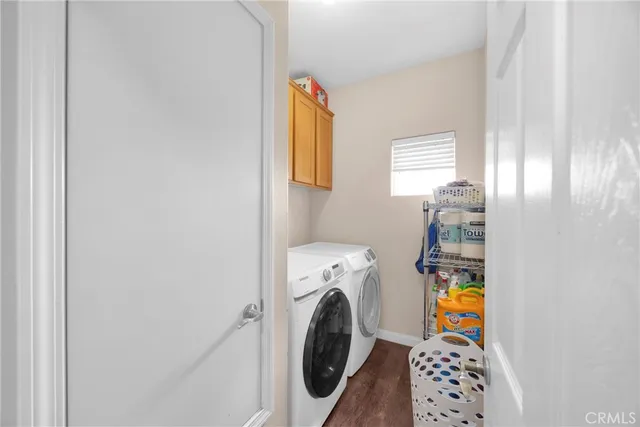 a bedroom with furniture and ceiling fan