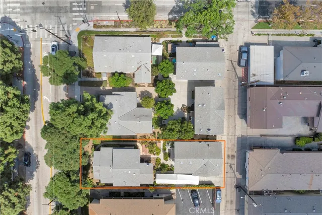 an aerial view of a house with swimming pool