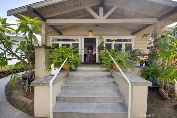 a front view of a house with a porch