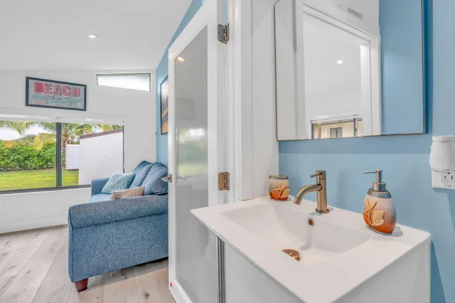 an aerial view of residential building with ocean view