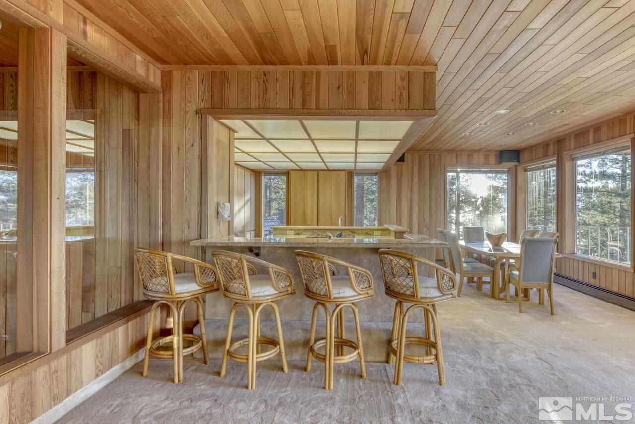 118 Ponderosa Zephyr Cove, NV 89448 - Photo 11 of 31 a view of a dining room with furniture window and outside view