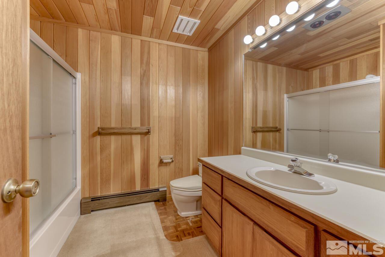 118 Ponderosa Zephyr Cove, NV 89448 - Photo 26 of 31 a bathroom with a sink toilet and shower