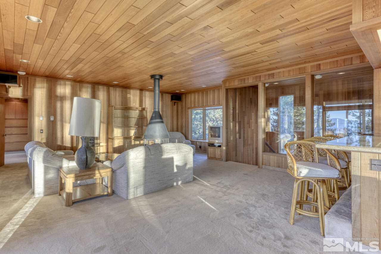 118 Ponderosa Zephyr Cove, NV 89448 - Photo 5 of 31 a living room with furniture and a large window