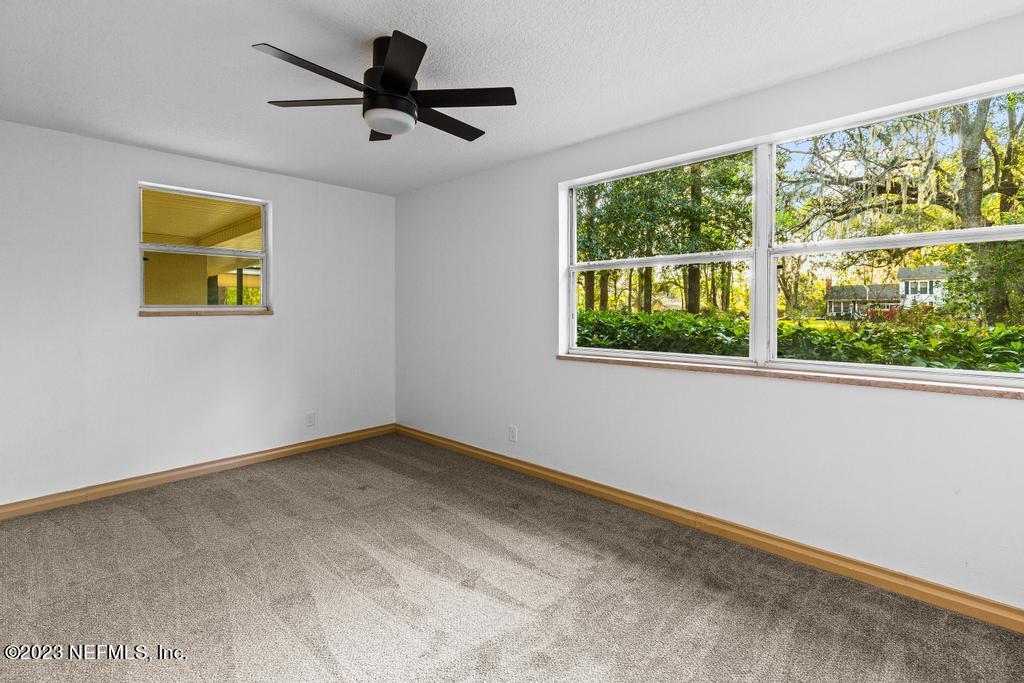 17 River Road Orange Park, FL 32073 - Photo 22 of 49 a view of an empty room with a window