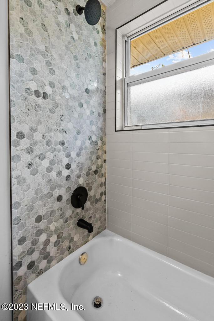 17 River Road Orange Park, FL 32073 - Photo 26 of 49 a bathroom with a bathtub