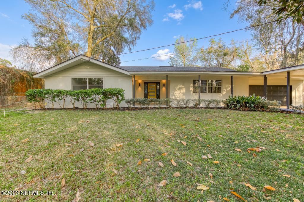 17 River Road Orange Park, FL 32073 - Photo 4 of 49 a front view of house with yard and green space