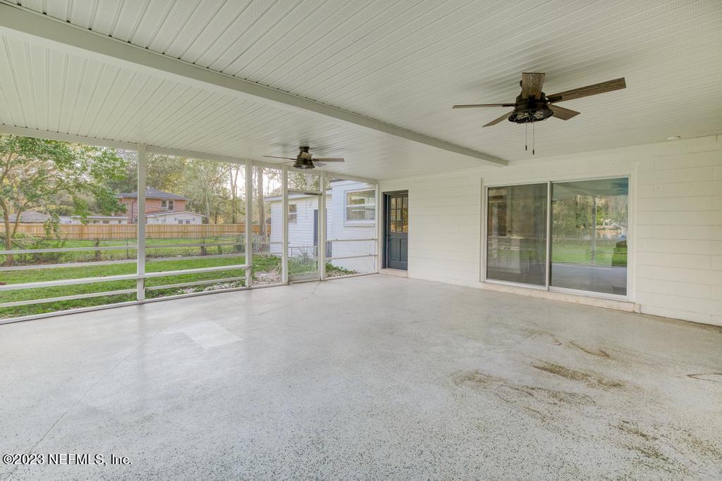 17 River Road Orange Park, FL 32073 - Photo 46 of 49 a view of a livingroom with a ceiling fan and window