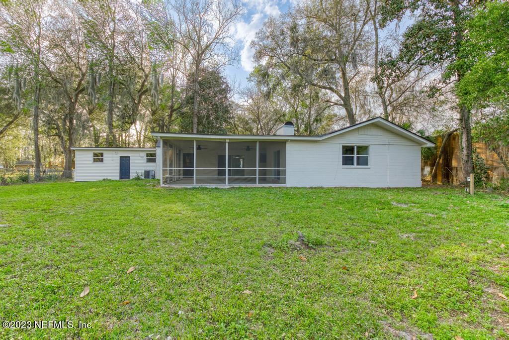 17 River Road Orange Park, FL 32073 - Photo 47 of 49 a view of a house with a yard and sitting area
