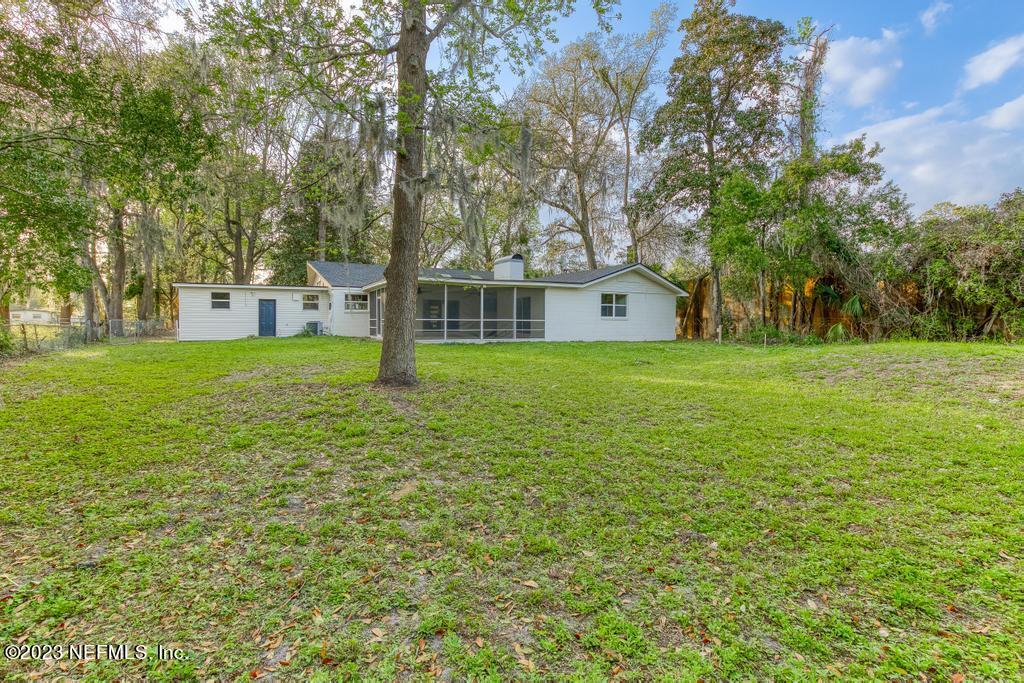 17 River Road Orange Park, FL 32073 - Photo 48 of 49 a view of a house with a yard