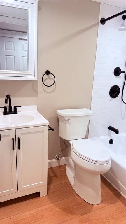49 Melrose Street, Unit 1H Melrose, MA 02176 - Photo 13 of 20 a bathroom with a sink toilet and shower