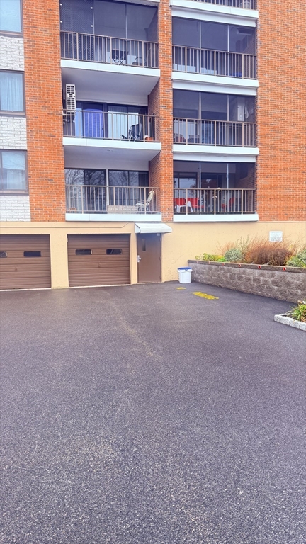 49 Melrose Street, Unit 1H Melrose, MA 02176 - Photo 18 of 20 a view of an empty room with shelves