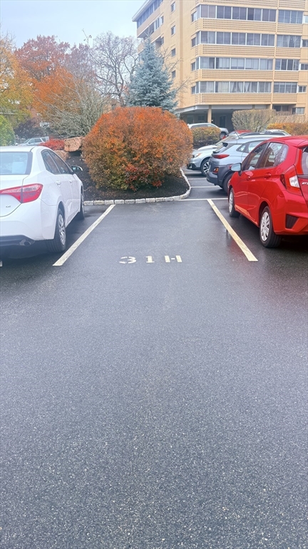 49 Melrose Street, Unit 1H Melrose, MA 02176 - Photo 19 of 20 a view of a street with cars