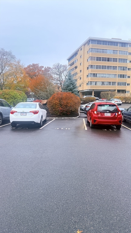 49 Melrose Street, Unit 1H Melrose, MA 02176 - Photo 20 of 20 an outdoor view of a street with cars