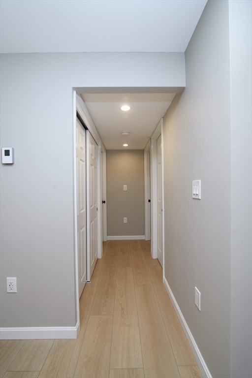 49 Melrose Street, Unit 1H Melrose, MA 02176 - Photo 7 of 20 a view of hallway with a hallway