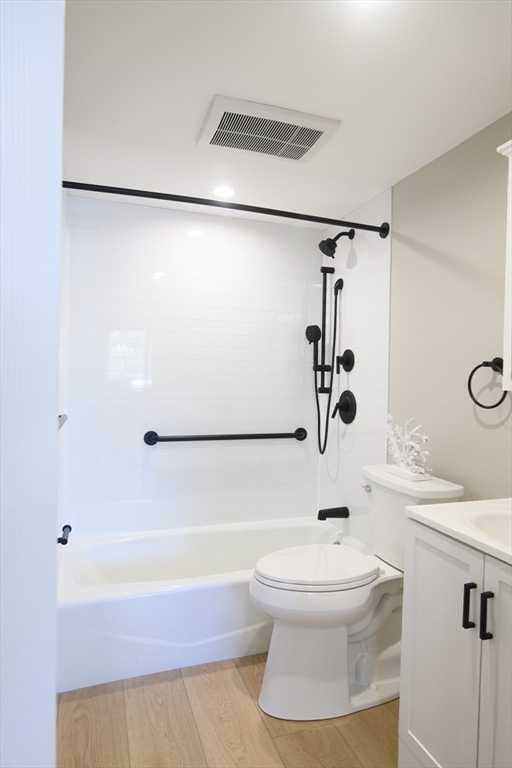 49 Melrose Street, Unit 1H Melrose, MA 02176 - Photo 10 of 20 a bathroom with a toilet and a shower