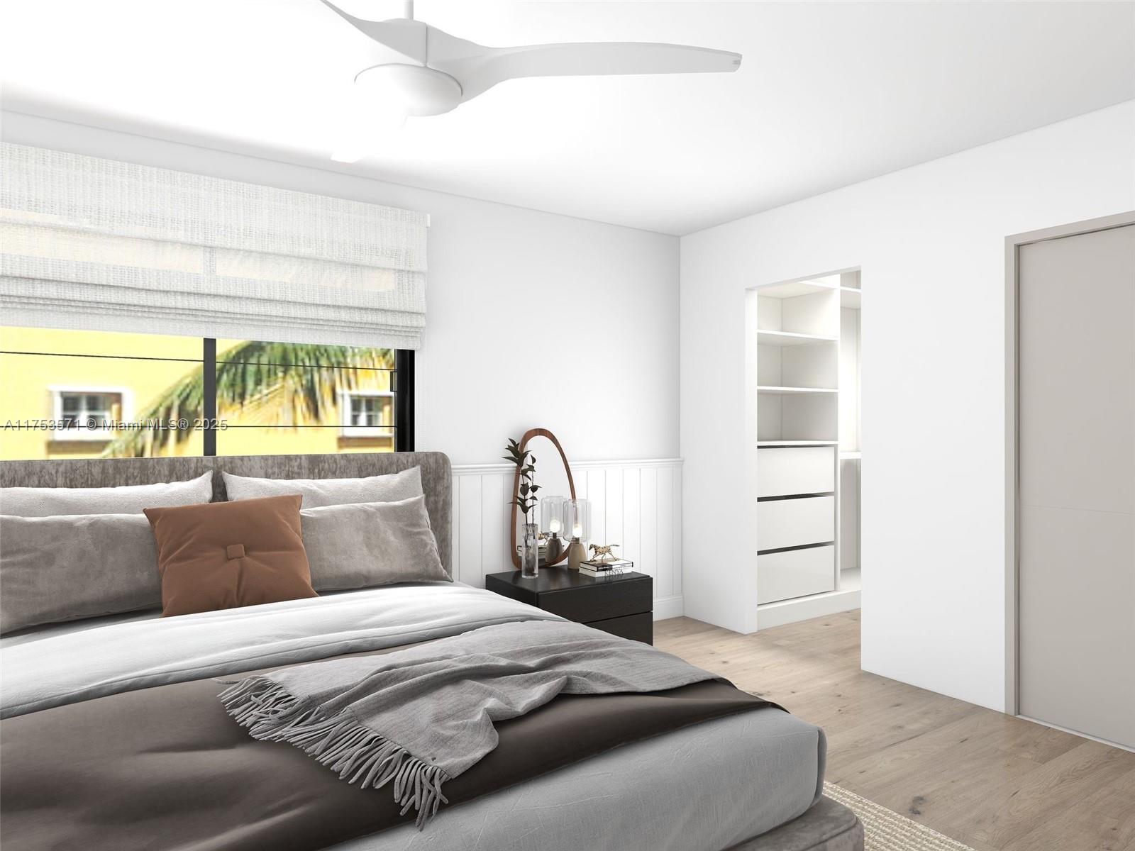 201 Jefferson Avenue, Unit 4C Miami Beach, FL 33139 - Photo 11 of 35 a bedroom with a bed and a large window