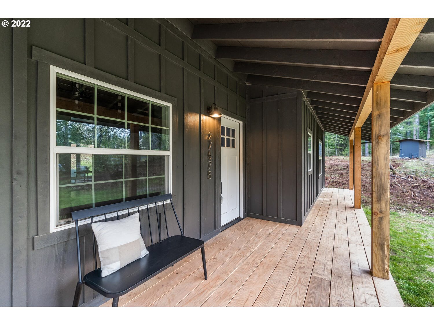 27678 South Uphill Road Colton, OR 97017 - Photo 3 of 29 a view of a room with wooden floor and windows