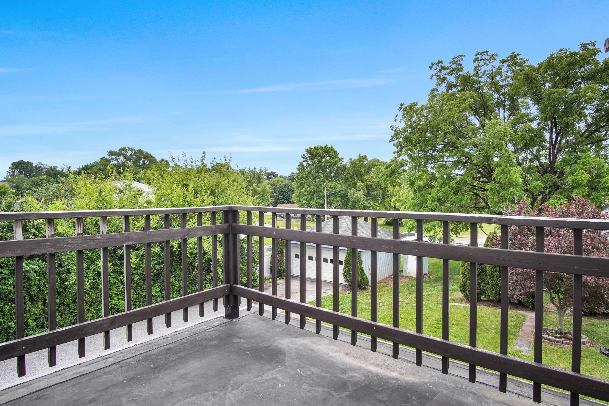 1976 Carlisle Road York, PA 17408 - Photo 27 of 39 Balcony view of lush greenery.