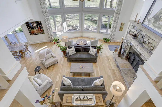 a living room with furniture or couch and a kitchen