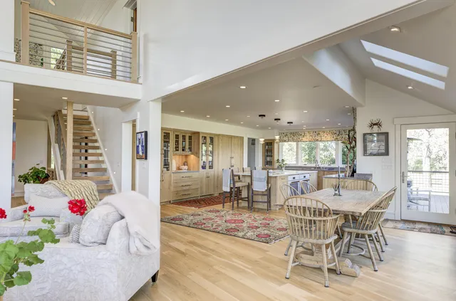 a view of a kitchen with a large window