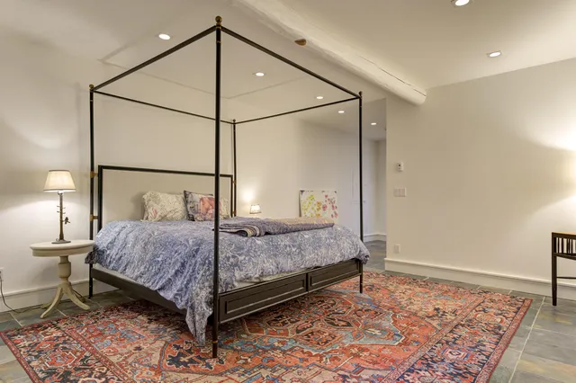 a view of a park with large trees