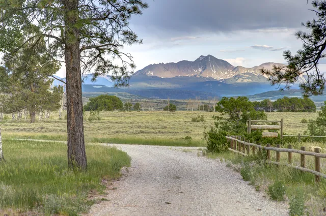a view of an ocean and a mountain