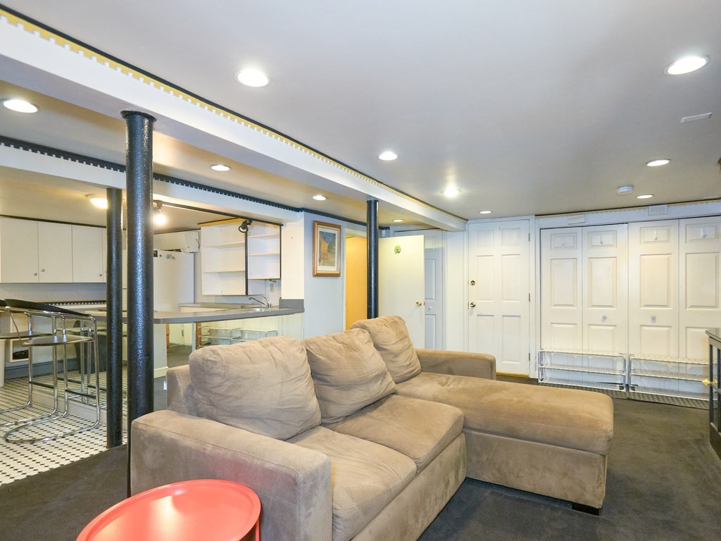 18 Atherton Road, Unit G Brookline, MA 02446 - Photo 6 of 15 a living room with furniture